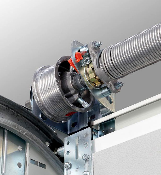   A professional replacing garage door cables to ensure safety and efficiency.