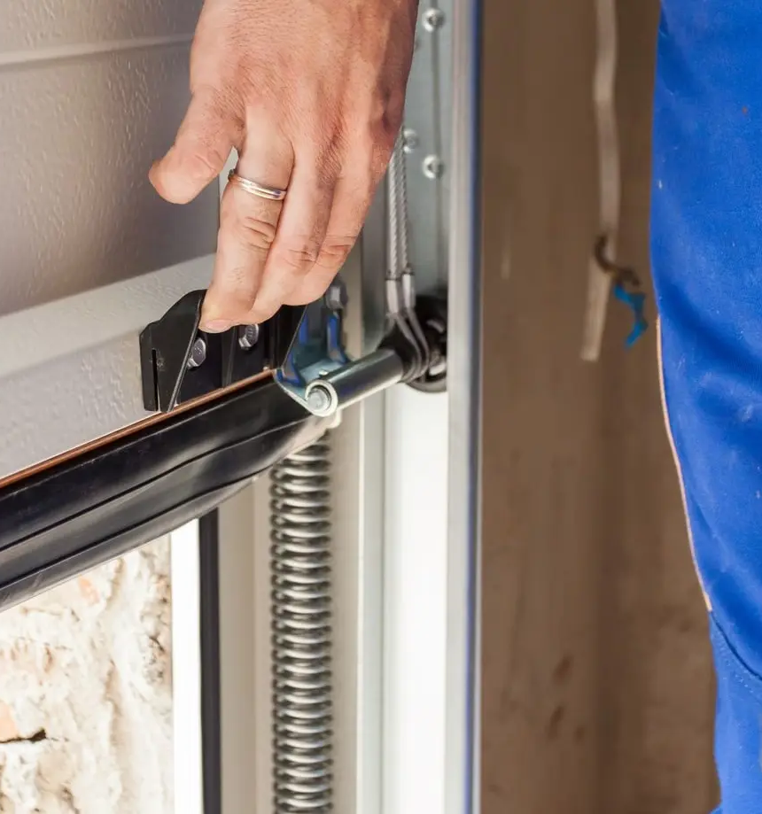 Thorough inspection of garage door components in Maryland, including springs, cables, and rollers, to ensure safety and functionality.